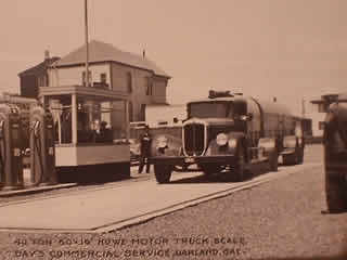 Picture of truck scale being inspected circa 1930.