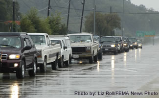 Photo of cars in rain.